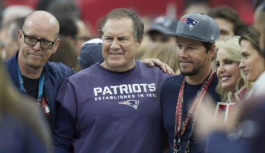 Super Bowl LI: Closeup of New England Patriots head coach Bill Belichick posing for photo on field with celebrity with actor Mark Wahlberg before game vs Atlanta Falcons at NRG Stadium. Houston, TX 2/5/2017