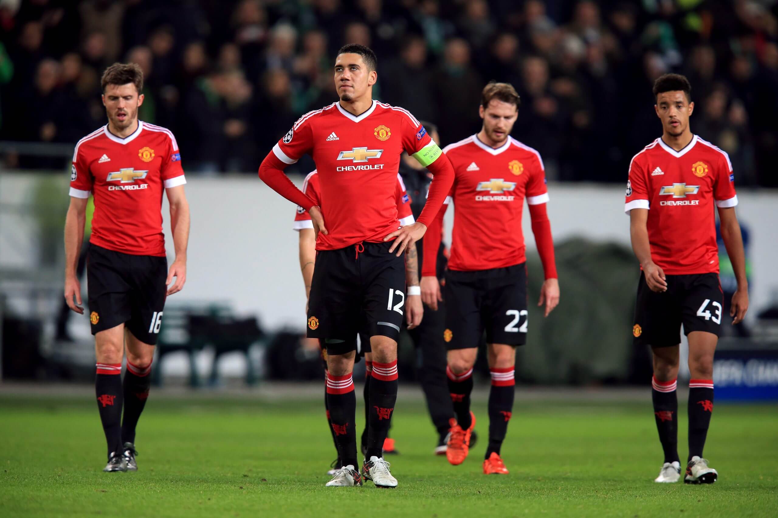 Manchester United players look disappointed