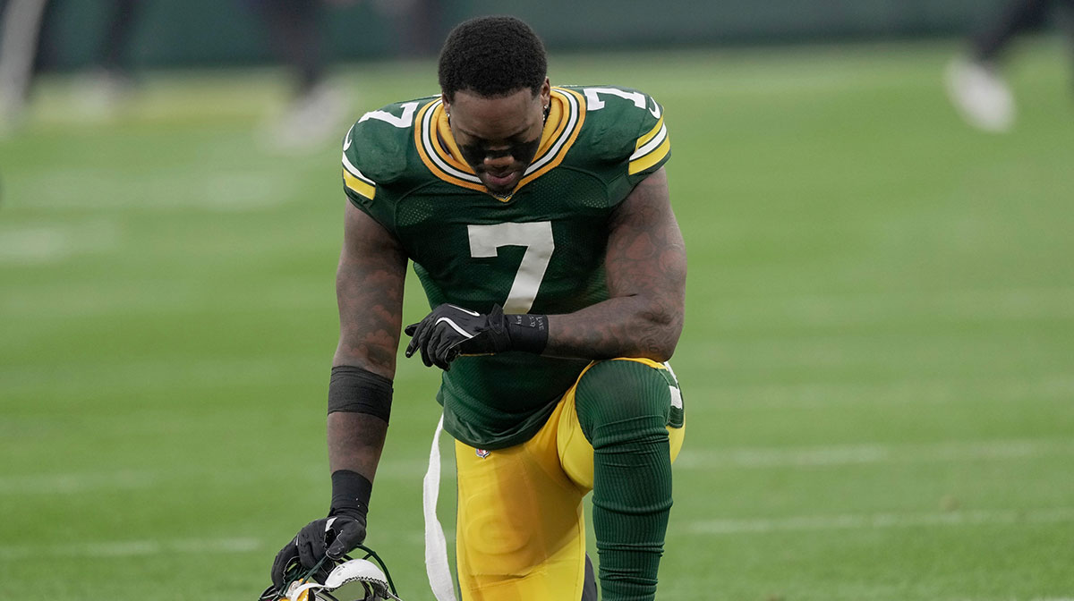 Green Bay Packers linebacker Quay Walker (7) takes a moment before their game against the San Francisco 49ers Sunday, November 24, 2024 at Lambeau Field in Green Bay, Wisconsin