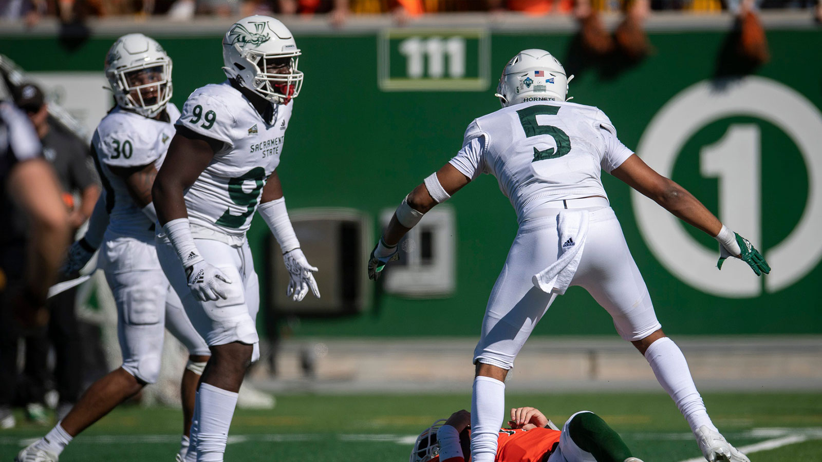 Sacramento State nickleback Marte Mapu (5) celebrates with his teammates after sacking Colorado State quarterback Clay Millen at Canvas Field in Fort Collins, Colo. on Saturday, Sept. 24, 2022. Ftc 0924 Ja Csu Sac Fball 76