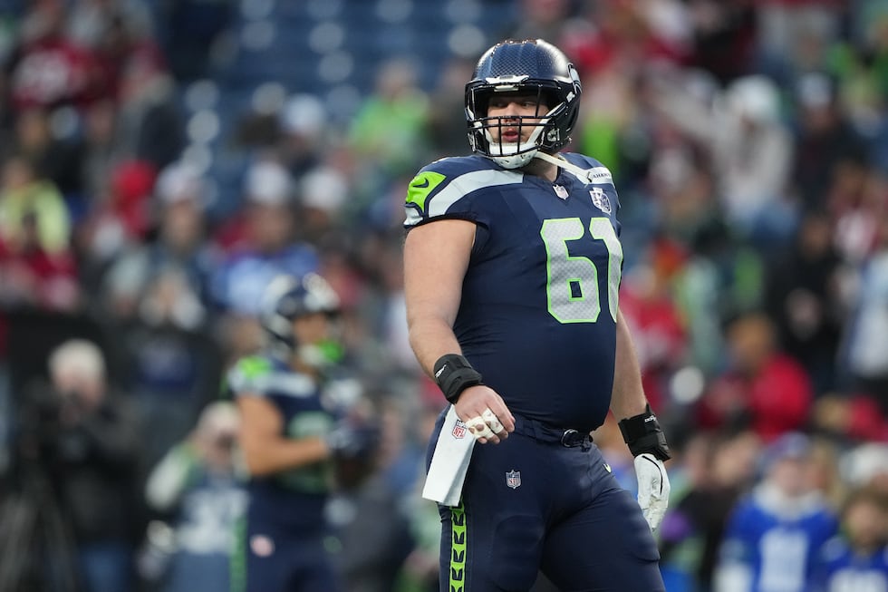 Seattle Seahawks center Jalen Sundell (61) warms up before an NFL football divisional playoff...
