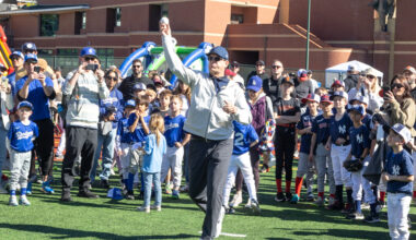 'Who's got it better than us?' Charger Coach Harbaugh asks. 'Nobody,' Manhattan Beach Little Leaguers answer