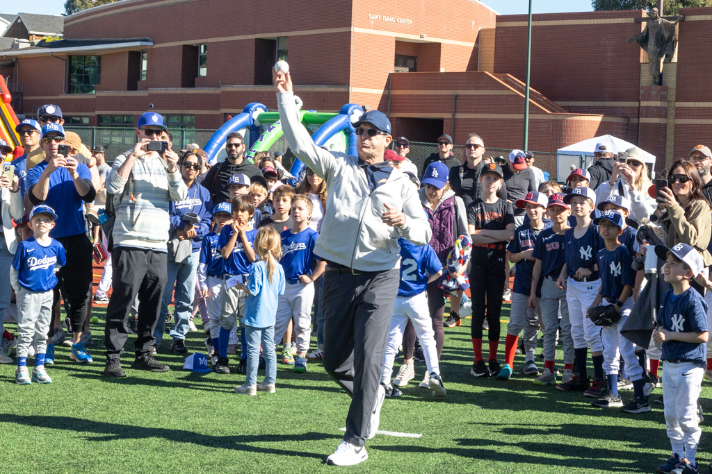 'Who's got it better than us?' Charger Coach Harbaugh asks. 'Nobody,' Manhattan Beach Little Leaguers answer