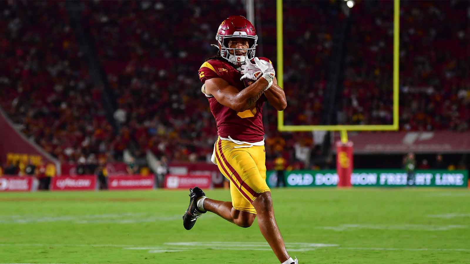 Southern California Trojans wide receiver Makai Lemon (6) runs for a touchdown against the Michigan State Spartans during the second half at the Los Angeles Memorial Coliseum.