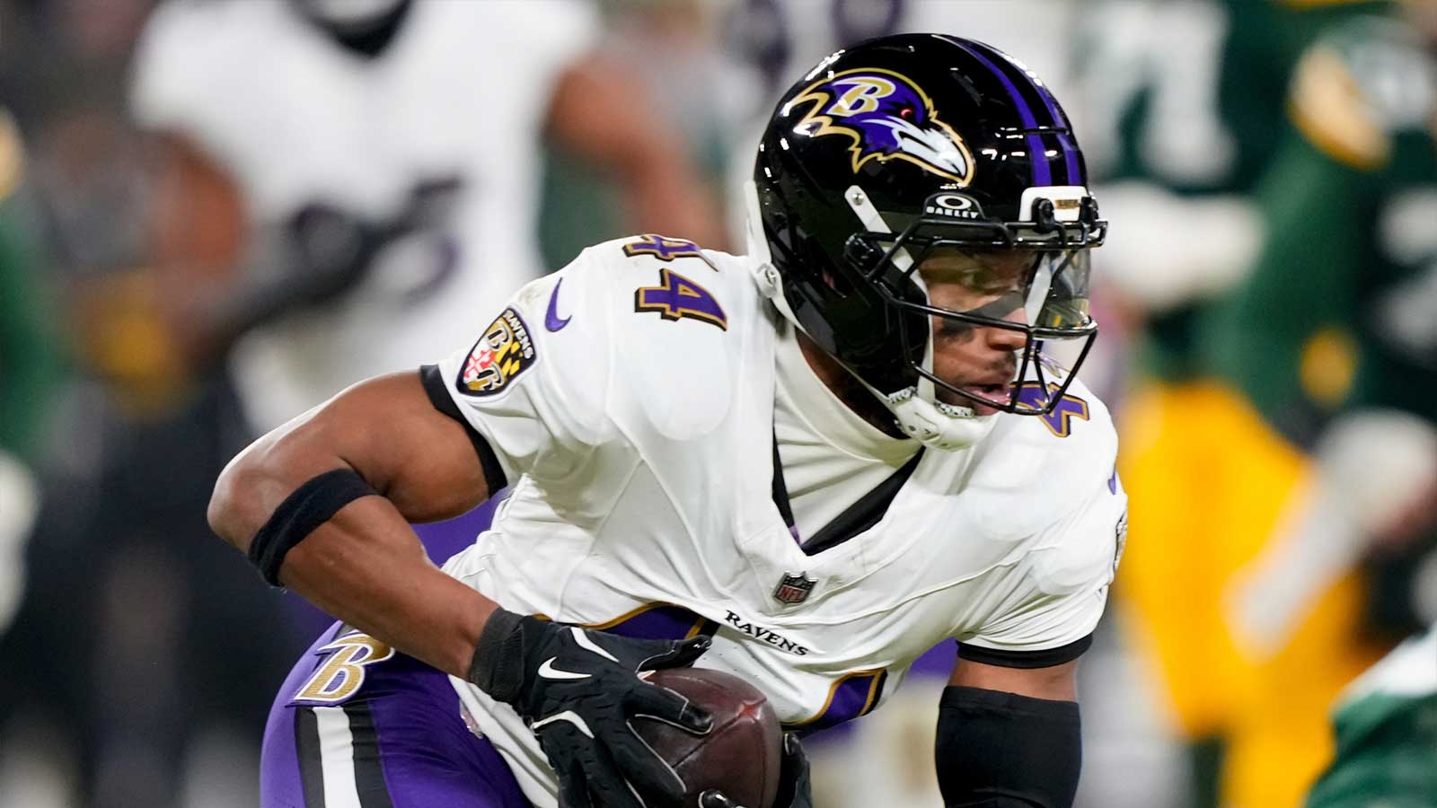 Baltimore Ravens cornerback Marlon Humphrey (44) intercepts a pass during the fourth quarter against the Green Bay Packers at Lambeau Field.