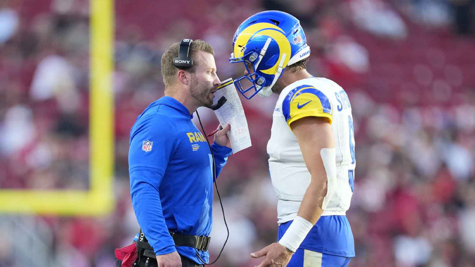 Los Angeles Rams head coach Sean McVay talks with Los Angeles Rams quarterback Matthew Stafford (9) during the fourth quarter against the San Francisco 49ers at Levi's Stadium.
