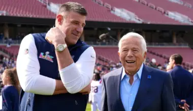 STANFORD, CALIFORNIA - FEBRUARY 07: Head coach Mike Vrabel of the New England Patriots talks with team owner Robert Kraft before taking a team photo prior to Super Bowl LX at Stanford Stadium on February 07, 2026 in Stanford, California