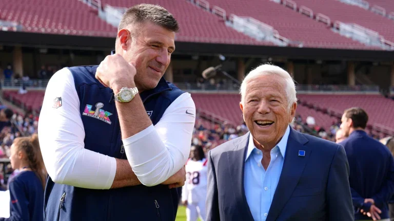 STANFORD, CALIFORNIA - FEBRUARY 07: Head coach Mike Vrabel of the New England Patriots talks with team owner Robert Kraft before taking a team photo prior to Super Bowl LX at Stanford Stadium on February 07, 2026 in Stanford, California