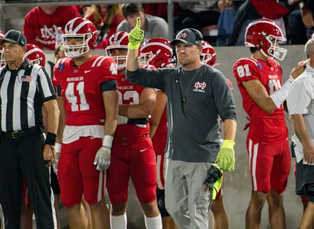 Mater Dei coach Frank McManus signals to his team during the Trinity League football game against Servite in Santa Ana on Friday, September 29, 2023. (Photo by Paul Rodriguez, Contributing Photographer)
