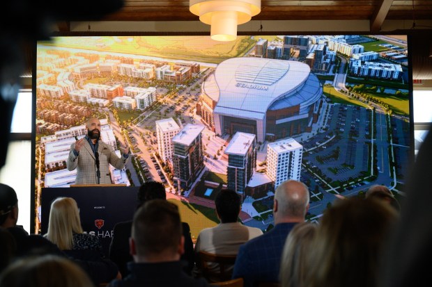 WeCreate Media CEO Wade Breitzke speaks as renderings are displayed behind him during a news conference in Portage concerning the proposed Chicago Bears stadium and development in the city on Wednesday, Feb. 11, 2026. (Kyle Telechan/for the Post-Tribune)