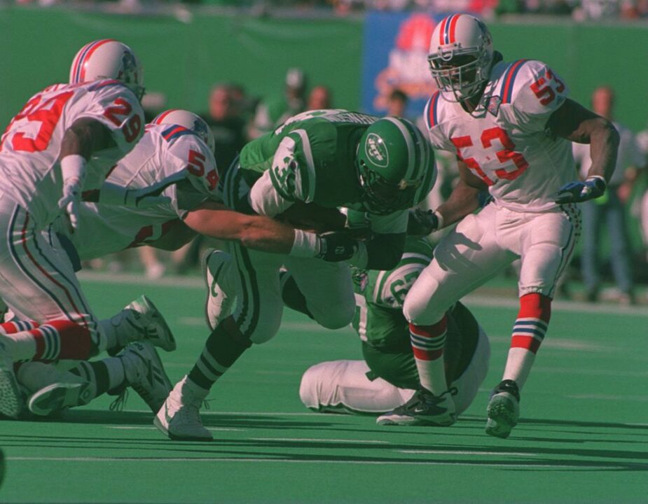 16 OCT 1994: JOHNNY JOHNSON OF THE NEW YORK JETS CRASHES THROUGH THE DEFENSE OF THE NEW ENGLAND PATRIOTS DURING THEIR GAME AT GIANTS STADIUM IN EAST RUTHERFORD, NEW JERSEY. Mandatory Credit: