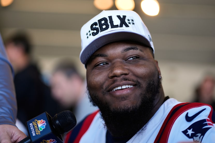 New England Patriots defensive end Milton Williams talks to the media during a news...