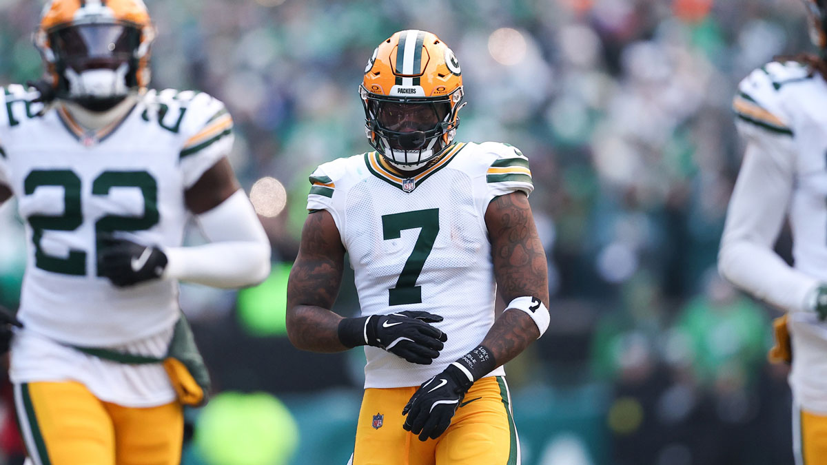 Quay Walker in the middle in a mystery NFL uniform, Question marks in the background