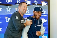 Dallas Cowboys head coach Brian Schottenheimer jokingly shakes new defensive coordinator...