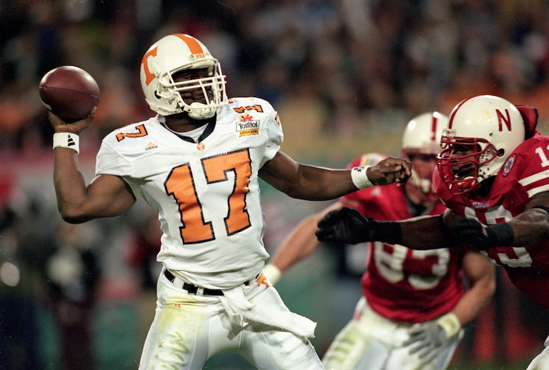 2 Jan 2000:  Tee Martin #17 of the Tennessee Volunteers gets ready to pass the ball as Carlos Polk #13 of the Nebraska Cornhuskers comes at him during the Fiesta Bowl Game at the Sun Devil Stadium in Tempe, Florida. The Cornhuskers defeated the Volunteer