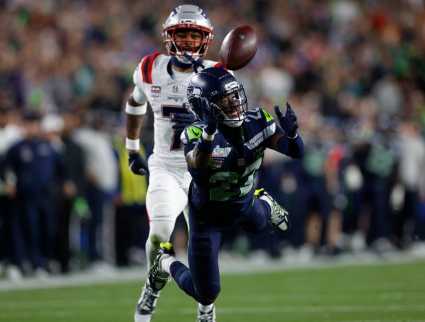 Seattle Seahawks' Rashid Shaheed (22) can't make a catch against New England Patriots' Carlton Davis III (7) in the fourth quarter of Super Bowl 60 at Levi's Stadium in Santa Clara, Calif., on Sunday, Feb. 8, 2026. (Nhat V. Meyer/Bay Area News Group)
