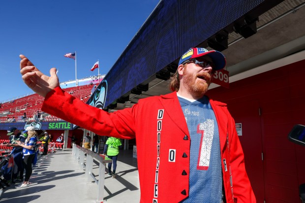 New England Patriots fan Tucker Gorman, of Boulder Creek, wears his custom-designed jacket before Super Bowl 60 against the Seattle Seahawks at Levi's Stadium in Santa Clara, Calif., on Sunday, Feb. 8, 2026. (Ray Chavez/Bay Area News Group)