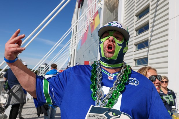 Seattle Seahawks fan Shanae Hemrick, of Washington, cheers before the start of the Super Bowl 60 against the New England Patriots at Levi's Stadium in Santa Clara, Calif., on Sunday, Feb. 8, 2026. (Ray Chavez/Bay Area News Group)