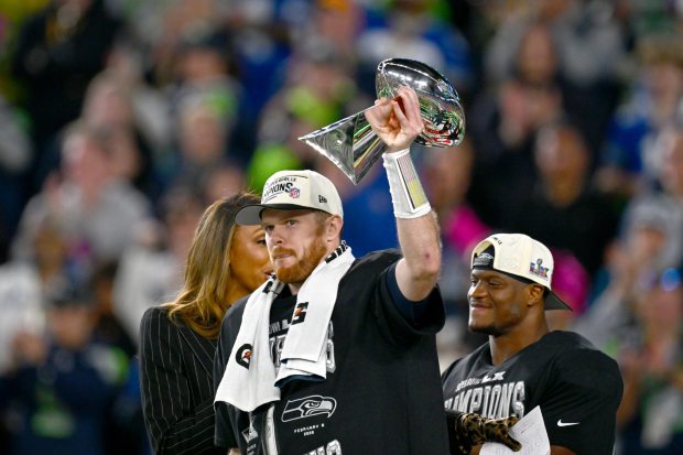 Seattle Seahawks quarterback Sam Darnold holds the Lombardi Trophy after winning Super Bowl 60 against the New England Patriots, Sunday, Feb. 8, 2026, in Santa Clara, Calif. (Jose Carlos Fajardo/Bay Area News Group)