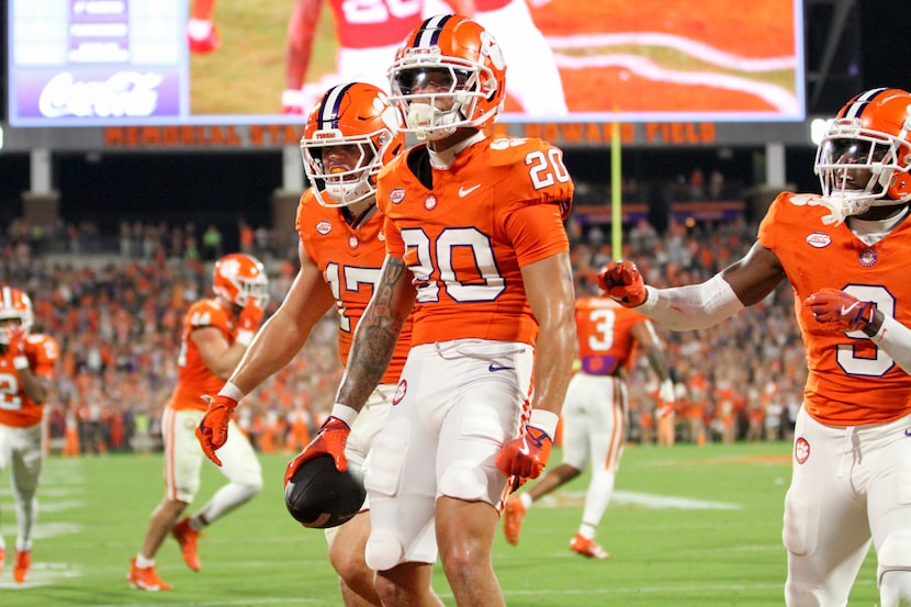 Clemson cornerback Avieon Terrell (20) celebrates his interception in the end zone during...