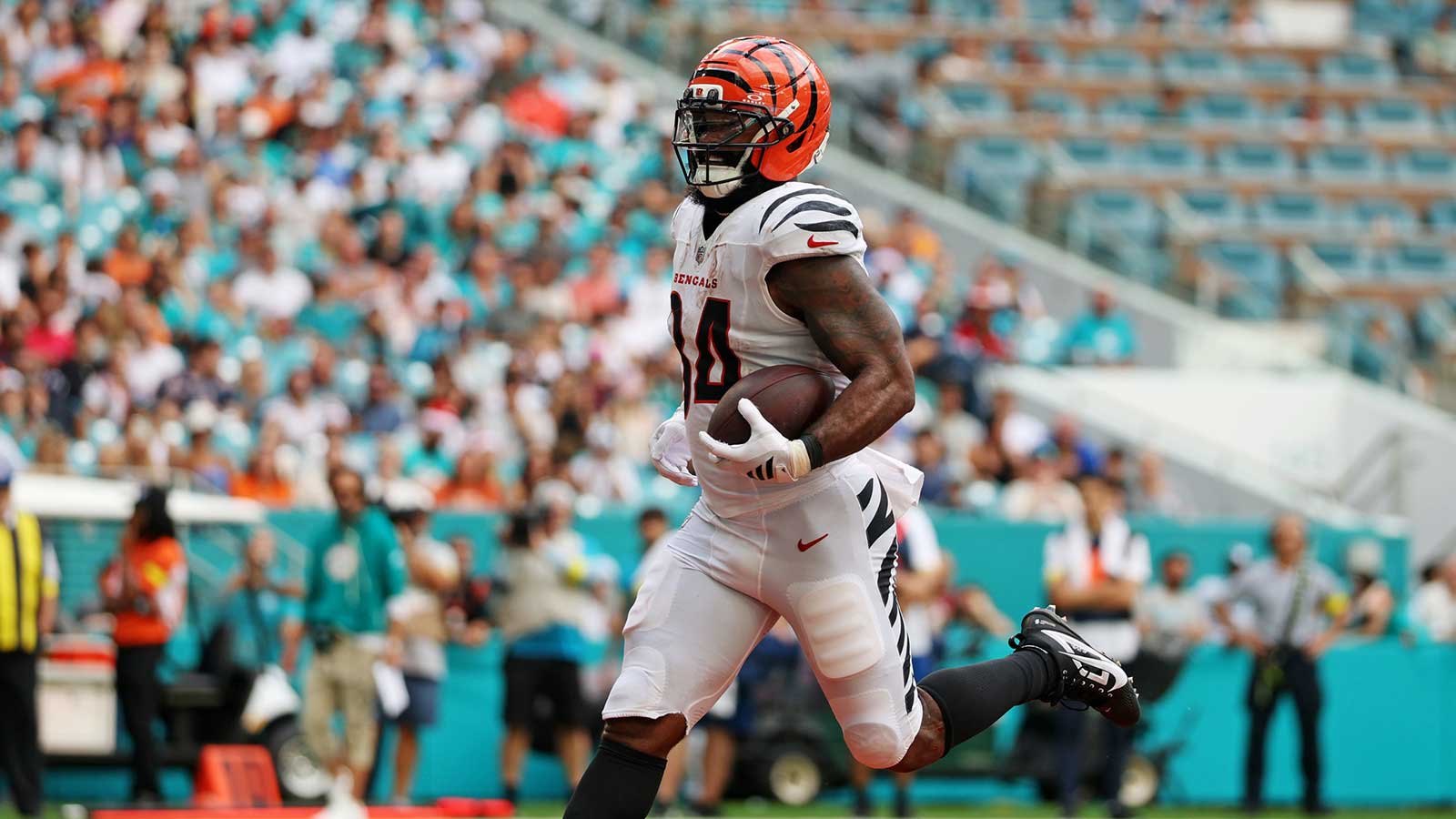 Cincinnati Bengals running back Samaje Perine (34) scores a touchdown during the second quarter against the Miami Dolphins at Hard Rock Stadium. 
