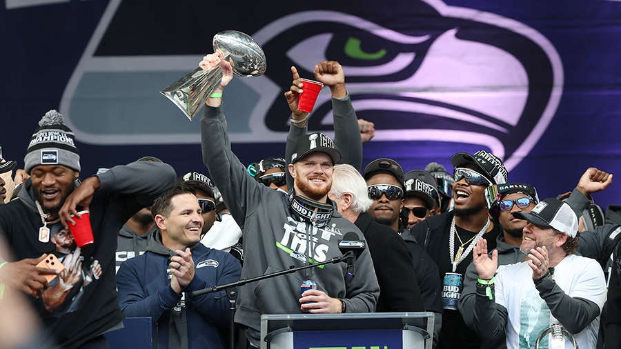 Seattle Seahawks Sam Darnold hoists trophy Super Bowl celebration 2026...