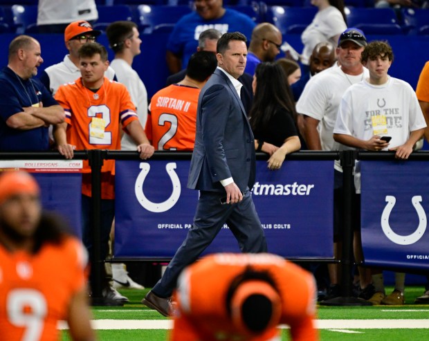 Denver Broncos general manager George Paton walks the sidelines before the game against the Indianapolis Colts at Lucas Oil Stadium in Indianapolis, Indiana, on Sunday, Sept. 14, 2025. (Photo by Andy Cross/The Denver Post)