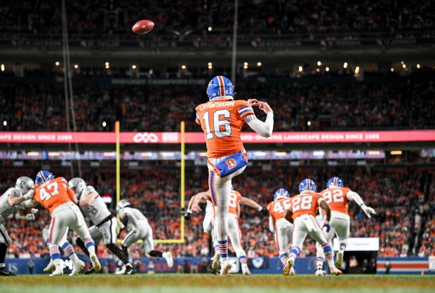 Jeremy Crawshaw (16) of the Denver Broncos punts during the second quarter at Empower Field at Mile High Stadium on Thursday, Nov. 6, 2025. (Photo by AAron Ontiveroz/The Denver Post)