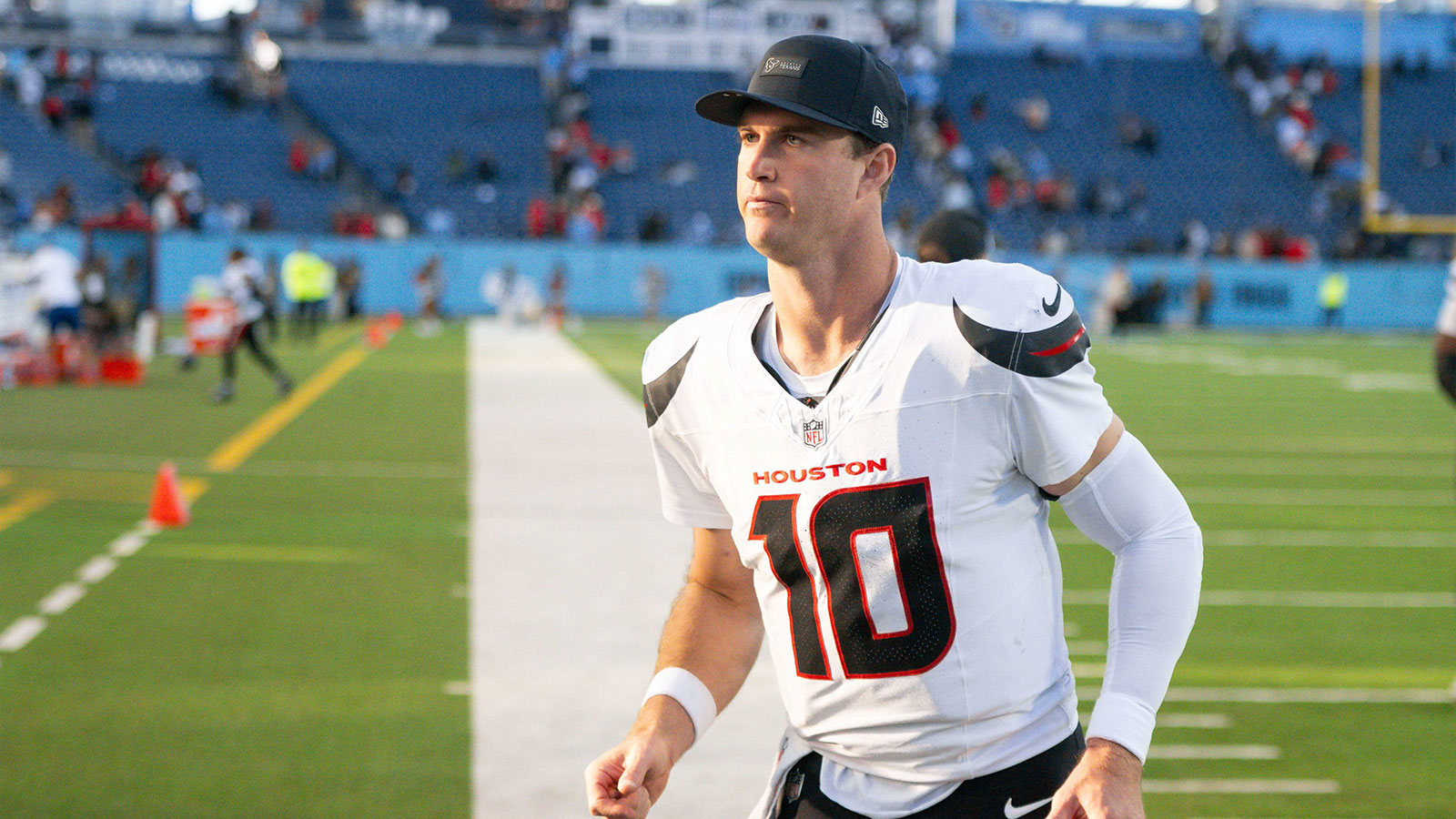 Houston Texans quarterback Davis Mills (10) runs off the field after the win against the Tennessee Titans during the second half at Nissan Stadium.