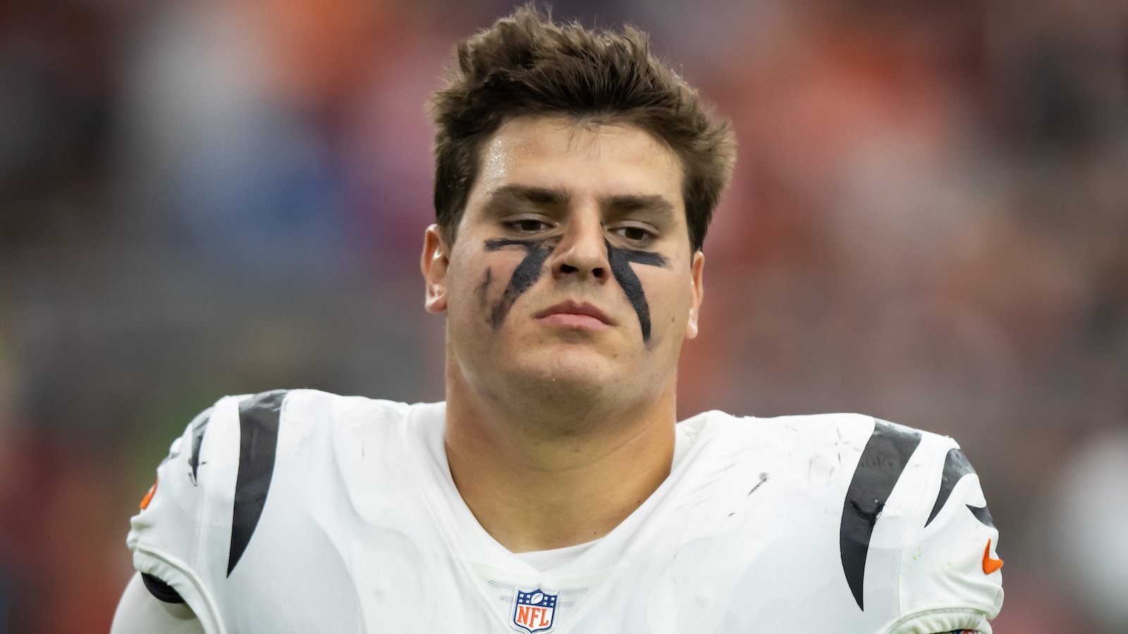 Trey Hendrickson looks on