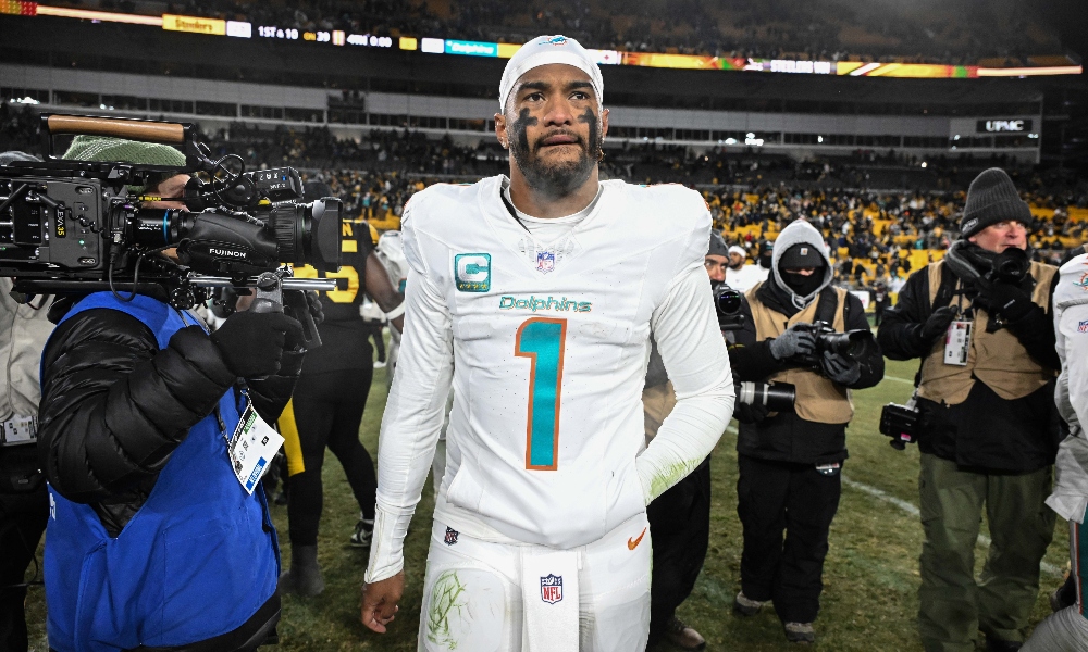 Dec 15, 2025; Pittsburgh, Pennsylvania, USA; Miami Dolphins quarterback Tua Tagovailoa (1) leaves the field following a game against the Pittsburgh Steelers at Acrisure Stadium.