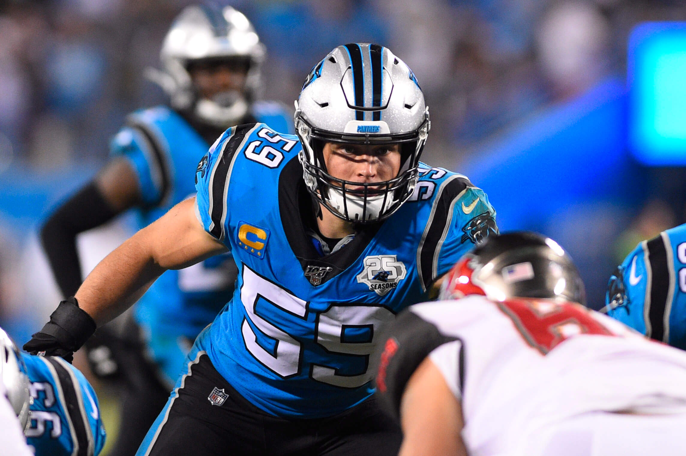 Carolina Panthers middle linebacker Luke Kuechly (59) waits to make a play in the third quarter of a 2019 game against the Tampa Bay Buccaneersat Bank of America Stadium.