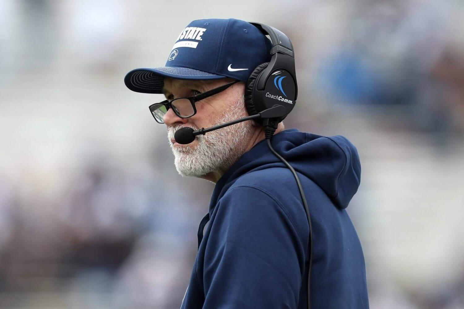 Penn State defensive coordinator Jim Knowles looks on while wearing a headset during the Nittany Lions' spring game.