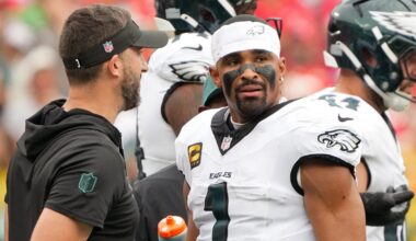 Sep 14, 2025; Kansas City, Missouri, USA; Philadelphia Eagles head coach Nick Sirianni speaks with quarterback Jalen Hurts (1) during the second quarter of the game against the Kansas City Chiefs at GEHA Field at Arrowhead Stadium.