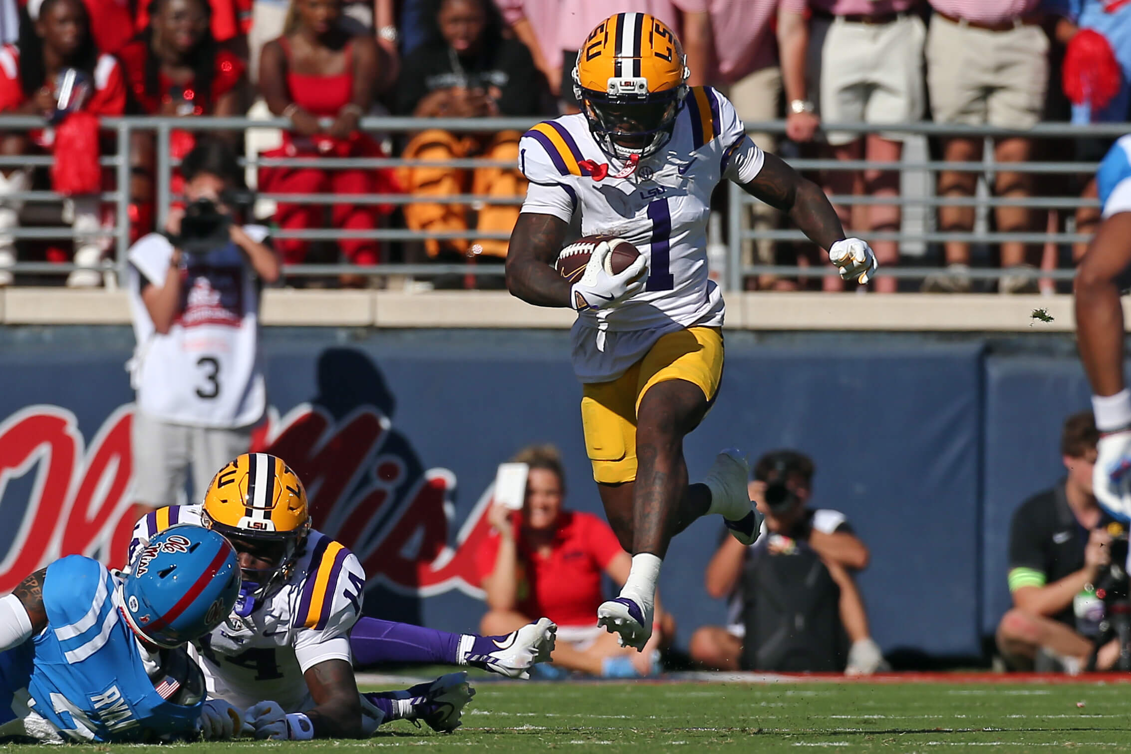 LSU Tigers wide receiver Aaron Anderson (1) runs after a catch during the second quarter against the Ole Miss Rebels at Vaught-Hemingway Stadium in Oxford, Miss.