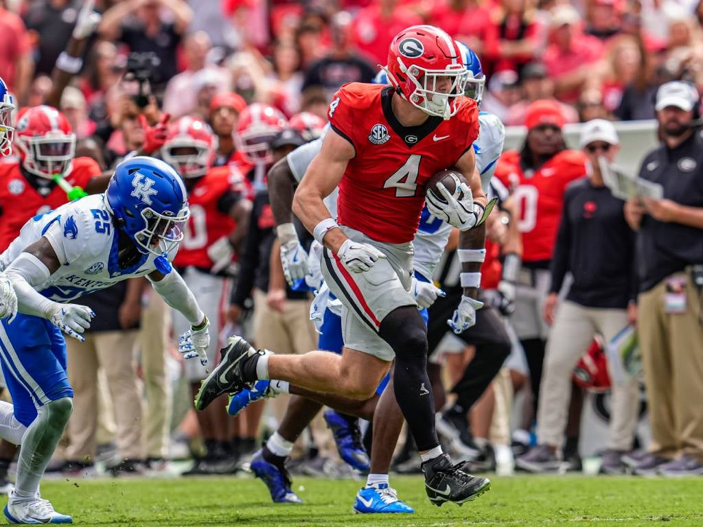 Oct 4, 2025; Athens, Georgia, USA; Georgia Bulldogs tight end Oscar Delp (4) runs against the Kentucky Wildcats after a catch at Sanford Stadium. Mandatory Credit: Dale Zanine-Imagn Images