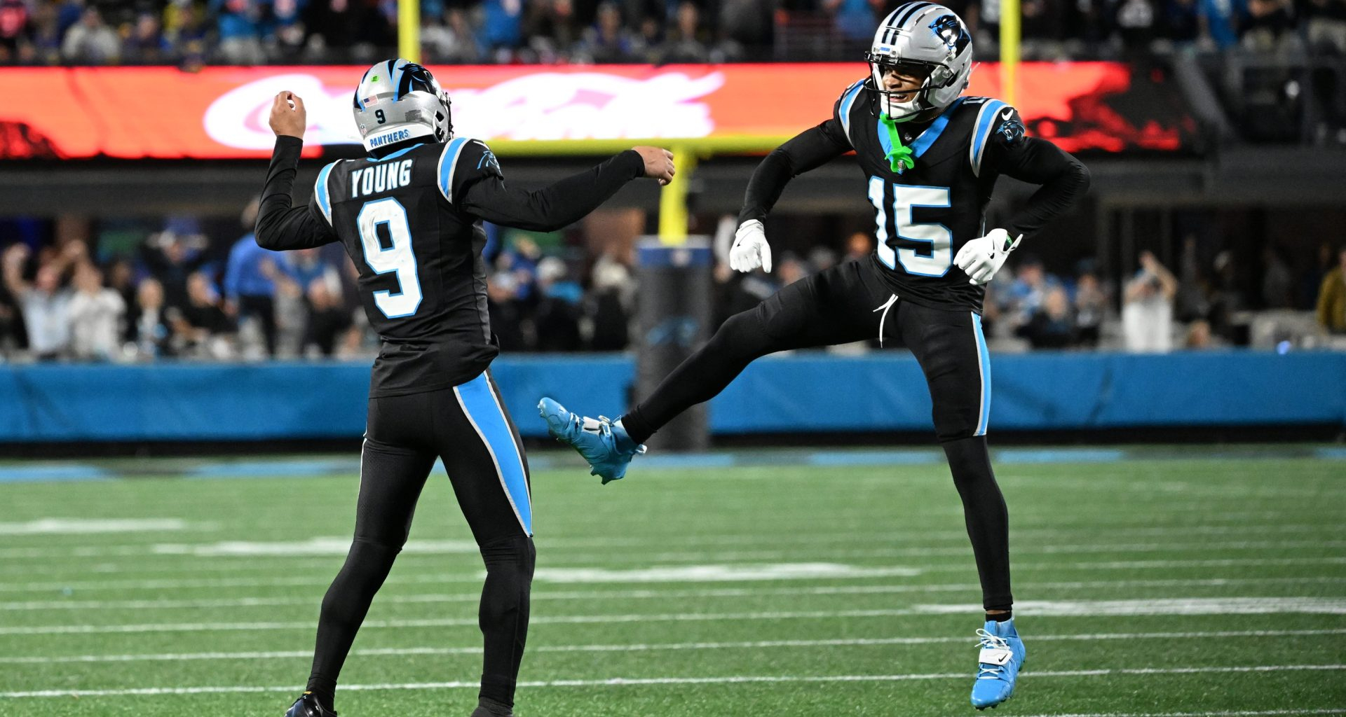 Jan 10, 2026; Charlotte, NC, USA; Carolina Panthers quarterback Bryce Young (9) and wide receiver Jimmy Horn Jr. (15) reacts in the fourth quarter in an NFC Wild Card Round game at Bank of America Stadium.