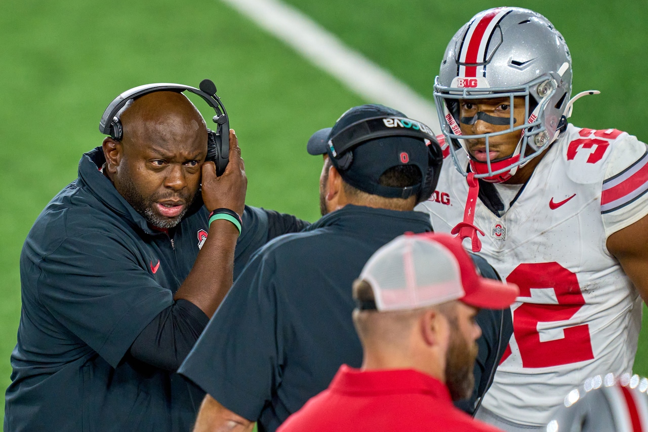 Ohio State Buckeyes running backs coach Tony Alford talks to head coach Ryan Day and running back TreVeyon Henderson (32) in action during a football game between the Notre Dame Fighting Irish and the Ohio State Buckeyes on September 23, 2023 at Notre Dame Stadium in South Bend, IN.
