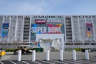 Workers get Levi's Stadium ready for Super Bowl LX between the Seattle Seahawks and the New...