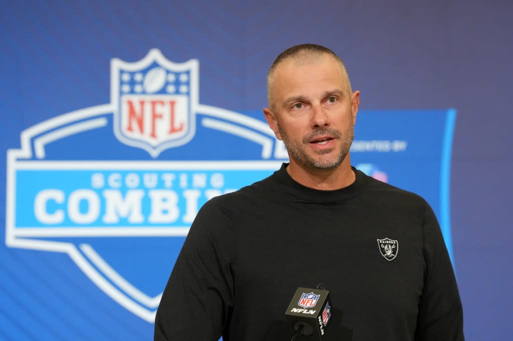 Las Vegas Raiders general manager John Spytek speaks at the NFL Scouting Combine at the Indiana Convention Center. Kirby Lee-Imagn Images