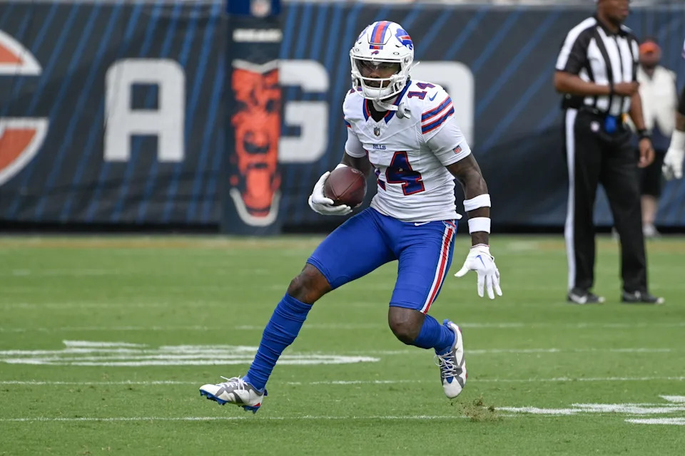 Aug 26, 2023; Chicago, Illinois, USA; Buffalo Bills wide receiver Stefon Diggs (14) runs with the ball during the first half against the Chicago Bears at Soldier Field. Mandatory Credit: Matt Marton-USA TODAY Sports