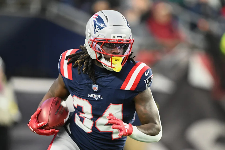 Jan 4, 2026; Foxborough, Massachusetts, USA; New England Patriots running back D'Ernest Johnson (34) returns the opening kickoff against the Miami Dolphins during the first quarter at Gillette Stadium. Mandatory Credit: Brian Fluharty-Imagn Images