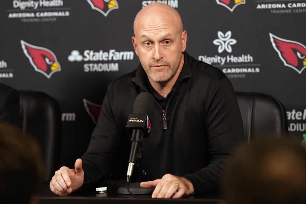 Arizona Cardinals General Manager Monti Ossenfort speaks at a press conference.