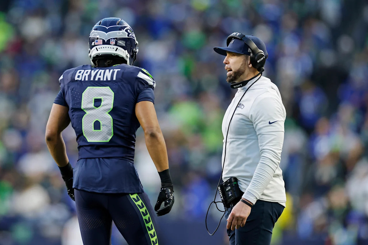 SEATTLE, WA - JANUARY 25: Safeties coach Jeff Howard of the Seattle Seahawks talks to Coby Bryant #8 during the NFC Championship game against the Los Angeles Rams on January 25, 2026 at Lumen Field in Seattle, Washington. (Photo by Joe Robbins/Icon Sportswire via Getty Images)