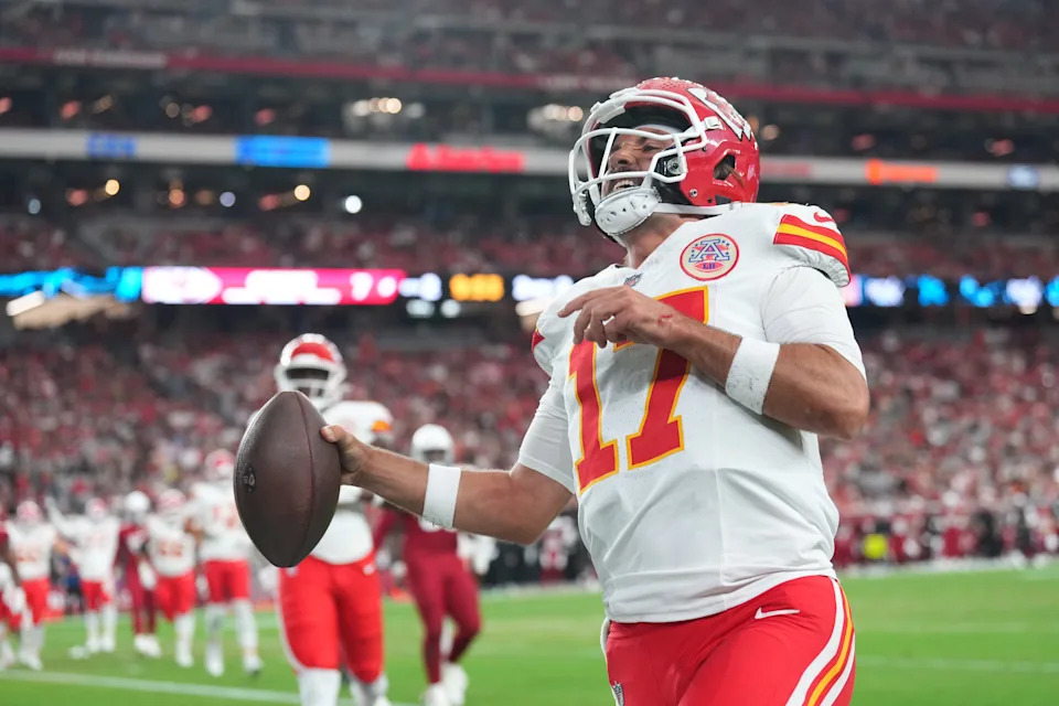 Aug 9, 2025; Glendale, Arizona, USA; Kansas City Chiefs quarterback Gardner Minshew (17) celebrates a touchdown against the Arizona Cardinals during the first half at State Farm Stadium. Mandatory Credit: Joe Camporeale-Imagn Images