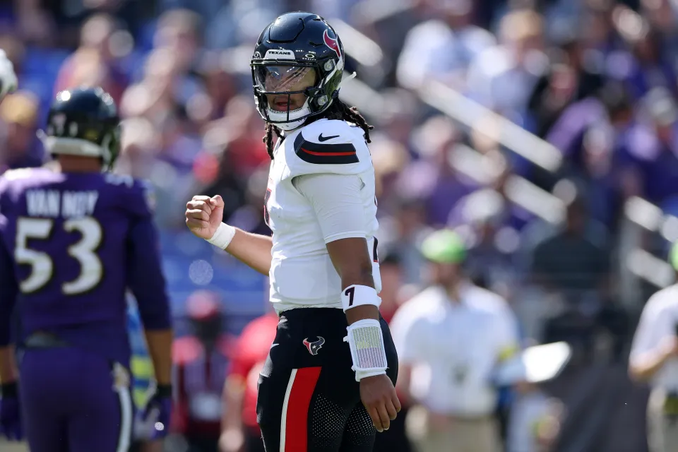 C.J. Stroud of the Texans celebrates a touchdown pass during the first quarter against the Baltimore Ravens in the game at M&T Bank Stadium on October 05, 2025
