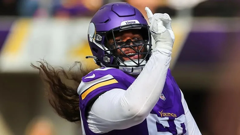 Levi Drake Rodriguez and Bo Richter celebrate after a defensive play.