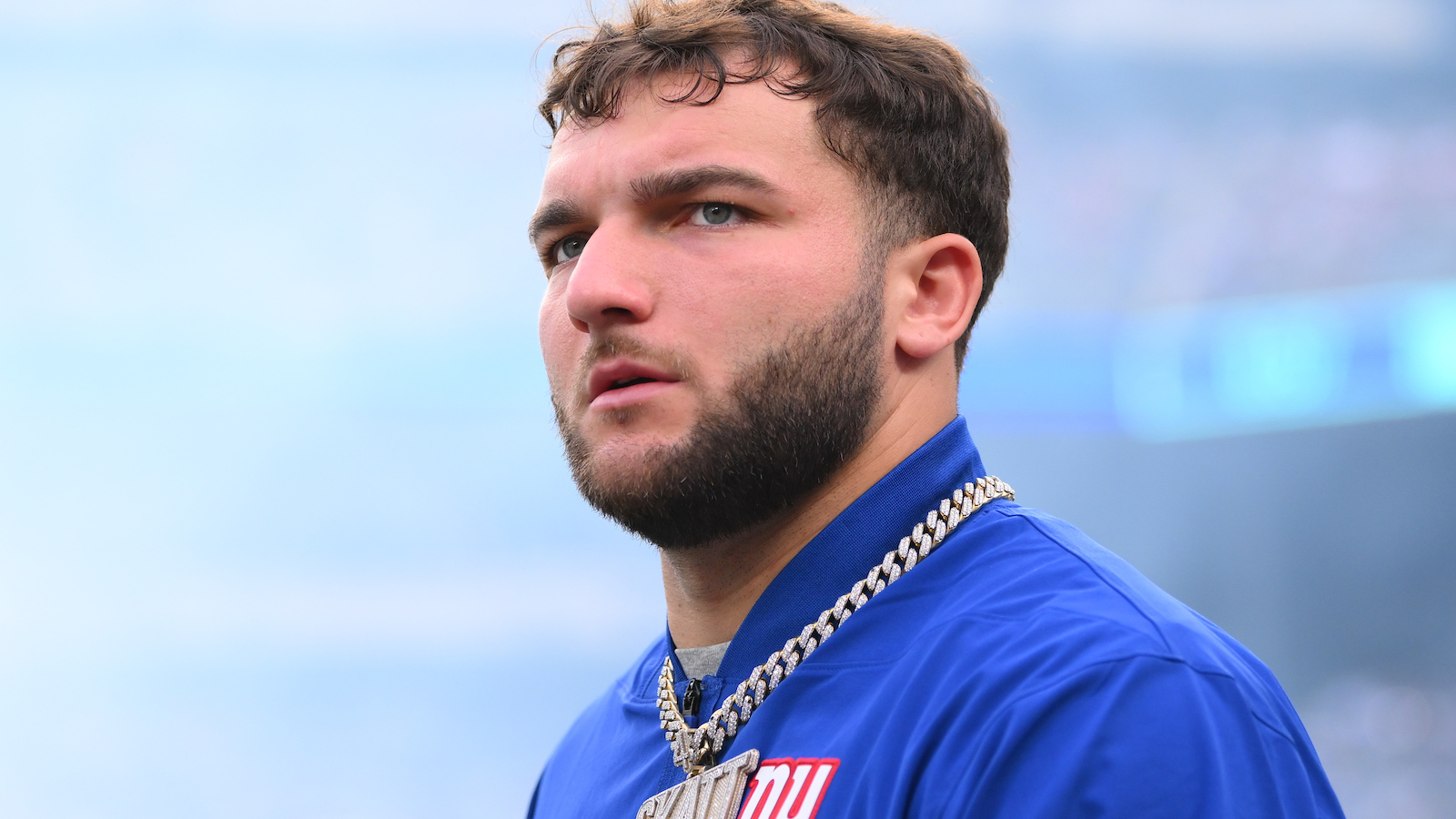 Giants rookie Cam Skattebo wearing a chain necklace