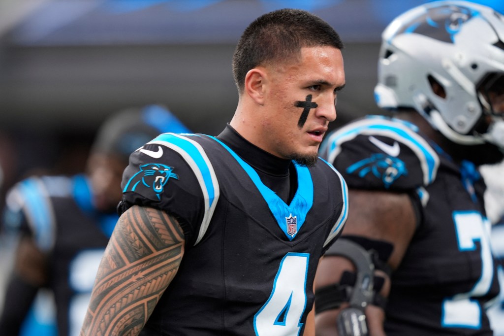 Carolina Panthers wide receiver Tetairoa McMillan (4) reacting during a game.