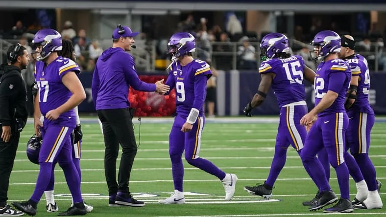 Vikings QB J.J. McCarthy and head coach Kevin O'Connell in Dallas in 2025